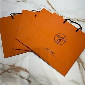 Hermès  Orange shopping Bag bundle of 4
